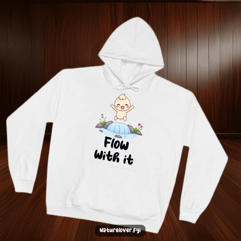 Funny hoodie with a happy character joyfully leaping over a small bubbling stream, radiating excitement and freedom.