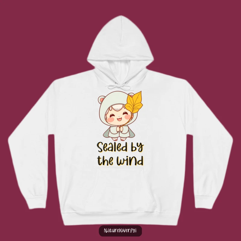 Cozy Funny Hoodie: Smiling Character Catches Golden Leaf in Breeze